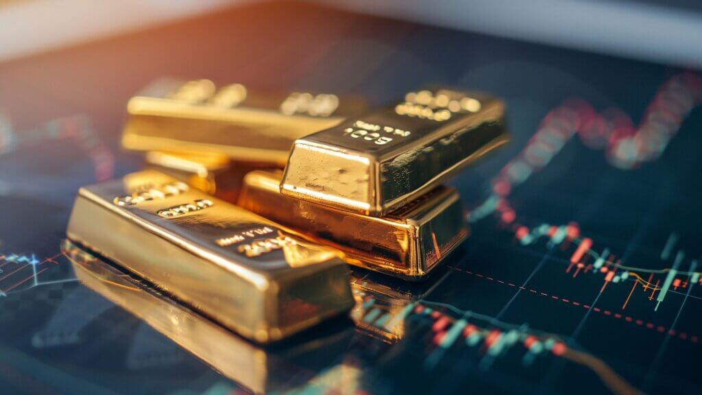 Goldbarren auf einem Finanzmarktchart – physisches Gold als sicherer Hafen während Wirtschaftszyklen, Inflation, Finanzkrisen und Währungsinstabilität.